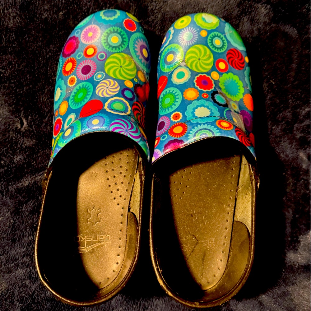 Dansko clogs multi-colored great condition size 41.